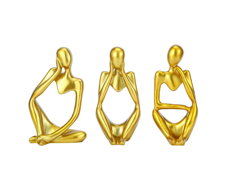 A set of three sculptural ornaments, suitable for living room furniture