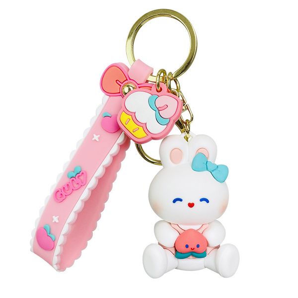 Pink - White Rabbit Holding a Peach Keychain